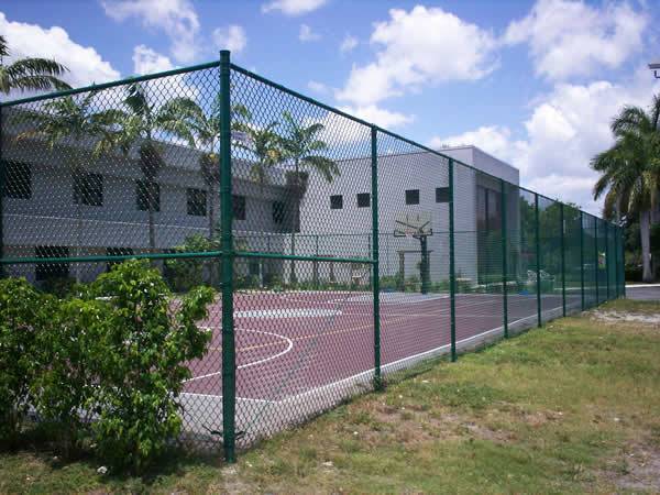 green chain link fence used in sports facilities